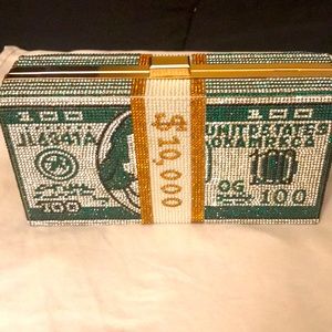 Custom designer Money Clutch, with a gold chain.